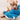 Brown pitbull laying down on carpet and playing with blue hammerhead shark plush dog toy