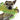 Close up view of small dog chewing at the body squeaker inside a green and yellow crocodile plush dog toy