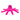 Pink octopus dog toy with a big smile on its face